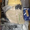 The photo shows a package with clothing in the category AM.