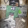 The photo shows a package with clothing in the category AM.
