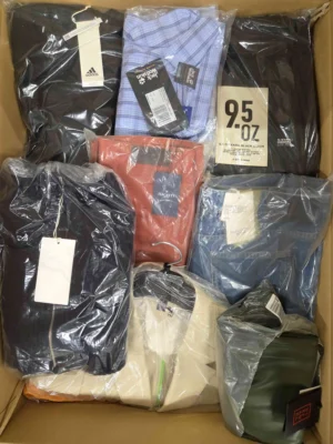 The photo shows a package with clothing in the category AM.