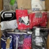 The photo shows a package with clothing in the category AM.