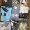 The photo shows a package with clothing in the category AM.