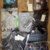 The photo shows a package with clothing in the category AM.