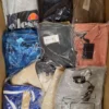 The photo shows a package with clothing in the category AM.