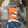 The photo shows a package with clothing in the category AM.