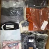 The photo shows a package with clothing in the category AM.