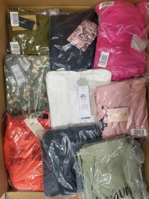 The photo shows a package with clothing in the category AR.