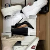 The photo shows a package with footwear in the category BS.