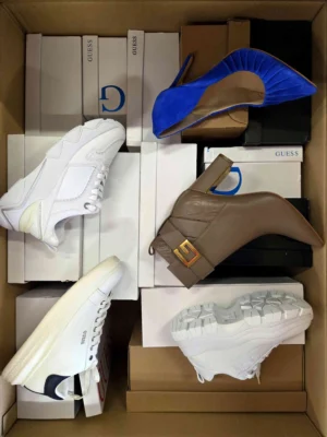 The photo shows a package with footwear in the category BS.