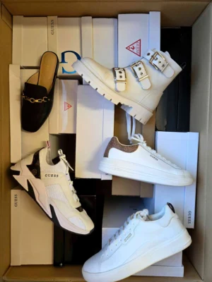 The photo shows a package with footwear in the category BS.