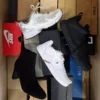 The photo shows a package with footwear in the category CS.