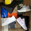 The photo shows a package with footwear in the category CS.