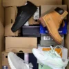 The photo shows a package with footwear in the category CS.