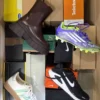 The photo shows a package with footwear in the category CS.