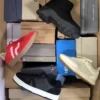 The photo shows a package with footwear in the category CS.