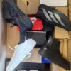 The photo shows a package with footwear in the category CS.