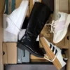 The photo shows a package with footwear in the category CS.