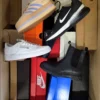 The photo shows a package with footwear in the category CS.