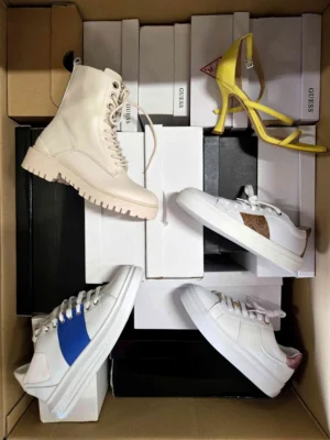 The photo shows a package with footwear in the category BS.