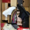The photo shows a package with footwear in the category CS.