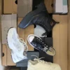 The photo shows a package with footwear in the category CS.