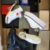 The photo shows a package with footwear in the category CS.