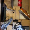 The photo shows a package with footwear in the category CS.