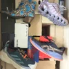The photo shows a package with footwear in the category CS.