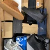 The photo shows a package with footwear in the category CS.