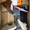 The photo shows a package with footwear in the category CS.