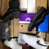 The photo shows a package with footwear in the category CS.