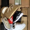 The photo shows a package with footwear in the category CS.