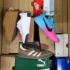 The photo shows a package with footwear in the category CS.