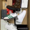 The photo shows a package with footwear in the category CS.