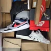 The photo shows a package with footwear in the category CS.