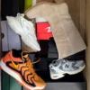 The photo shows a package with footwear in the category CS.
