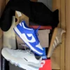 The photo shows a package with footwear in the category CS.