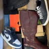 The photo shows a package with footwear in the category CS.