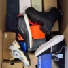 The photo shows a package with footwear in the category CS.