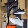 The photo shows a package with footwear in the category CS.