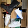 The photo shows a package with footwear in the category CS.