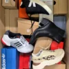 The photo shows a package with footwear in the category CS.