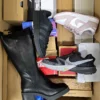 The photo shows a package with footwear in the category CS.