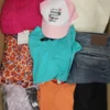 The photo shows a package with clothing in the category TSC.