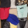 The photo shows a package with clothing in the category TSC.