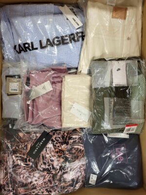 The photo shows a package with clothing in the category AW.