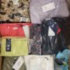 The photo shows a package with clothing in the category AW.