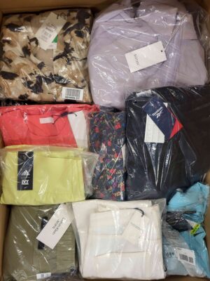 The photo shows a package with clothing in the category AW.
