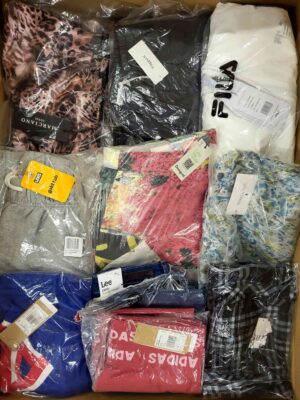 The photo shows a package with clothing in the category AW.