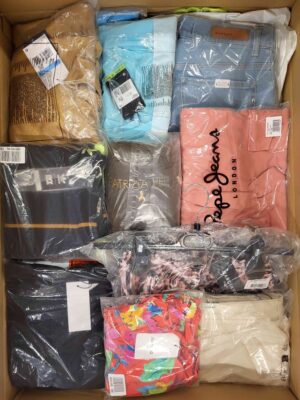 The photo shows a package with clothing in the category AW.