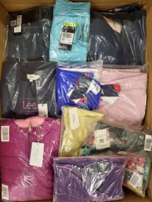 The photo shows a package with clothing in the category AW.